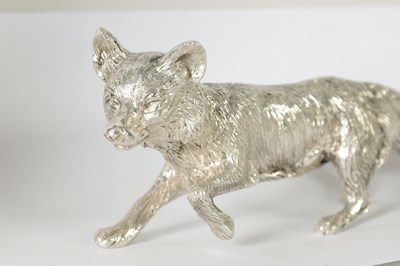 Lot 513 - A SOLID SILVER CAST MODEL OF A PROWLING FOX