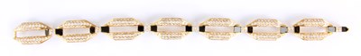 Lot 67 - A STYLISH FRENCH 18ct GOLD DIAMOND AND ONYX...