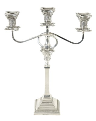 Lot 569 - A GEORGE V SILVER THREE-BRANCH CANDELABRA