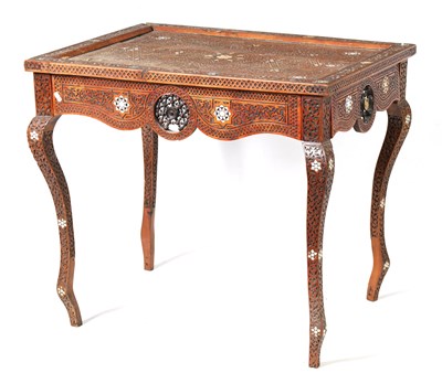 Lot 191 - A 19TH-CENTURY CARVED HARDWOOD ISLAMIC CENTRE TABLE