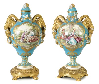 Lot 167 - A PAIR OF 19TH CENTURY SEVRES STYLE ORMOLU MOUNTED VASES AND COVERS