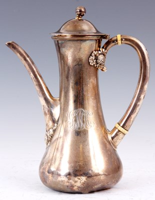 Lot 191 - AN AMERICAN SILVER COFFEE JUG of slender form...