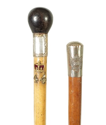 Lot 665 - TWO EARLY 20TH CENTURY MILITARY WALKING CANES