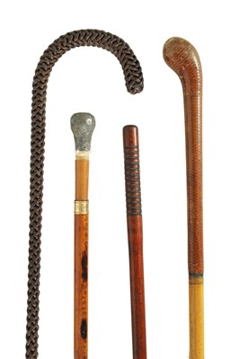 Lot 641 - A SELECTION OF FOUR WALKING CANES