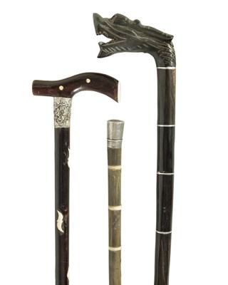 Lot 683 - A SELECTION OF THREE 19TH CENTURY INDIAN WALKING STICKS