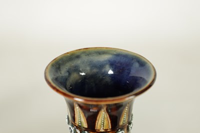 Lot 92 - A GOOD PAIR OF DOULTON LAMBETH FOOTED BULBOUS FLARED NECK VASES BEARING MONOGRAM FOR GEORGE TINWORTH