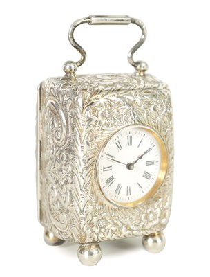 Lot 1231 - AN EARLY 20TH CENTURY MINIATURE SILVER CARRIAGE CLOCK