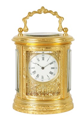 Lot 1206 - A LATE 19TH CENTURY FRENCH MINIATURE ENGRAVED OVAL CARRIAGE CLOCK