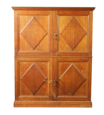 Lot 1389 - HOWARD & SONS LONDON, AN EARLY 20TH-CENTURY OAK CUPBOARD