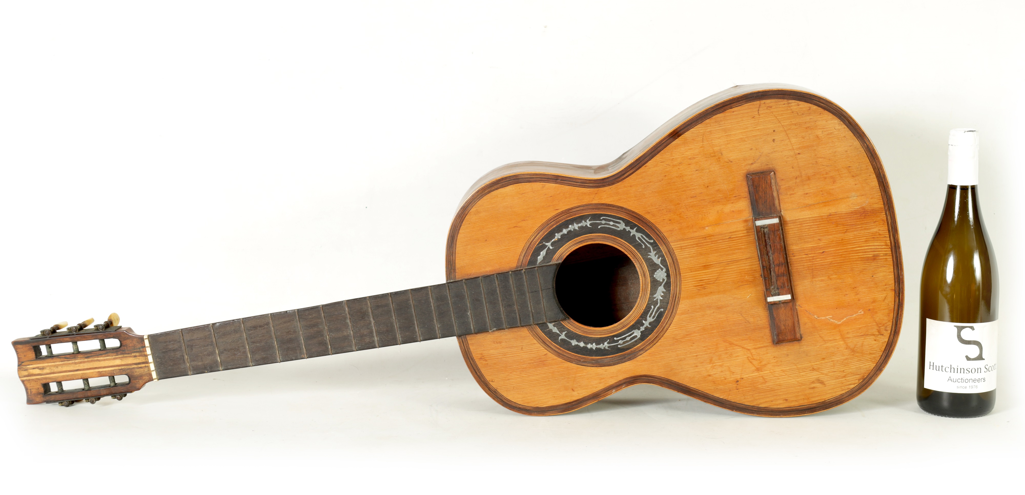 Lot 709 A LATE 19TH CENTURY SPANISH GUITAR BY