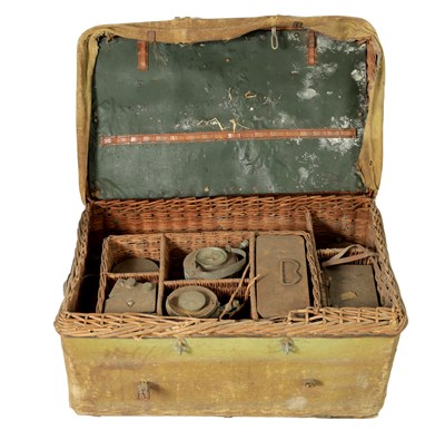 Lot 911 - A LATE 19TH CENTURY BASKET WEAVE MOTORING PICNIC HAMPER