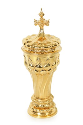 Lot 548 - AN ART DECO GOTHIC REVIVAL CONTINENTAL SILVER GILT PRESENTATION CUP AND COVER