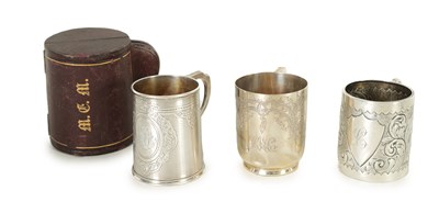 Lot 549 - A COLLECTION OF THREE SILVER CHRISTENING MUGS