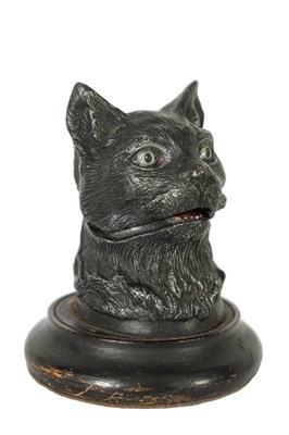 Lot 889 - A LATE 19TH CENTURY PATINATED METAL NOVELTY INKWELL AND LINER