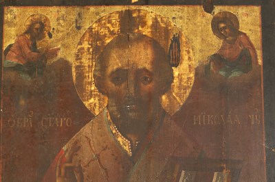 Lot 676 - AN EARLY DOUBLE-SIDED ICON DEPICTING ST NICHOLAS AND THE VIRGIN MARY WITH CHILD