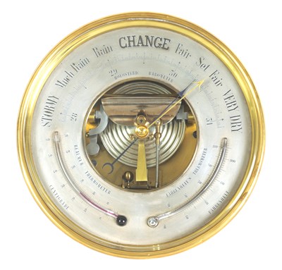 Lot 831 - A LATE 19TH CENTURY BRASS CASED ANEROID BAROMETER