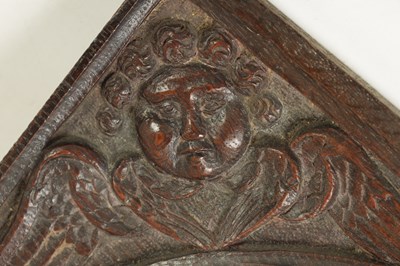 Lot 910 - A 17TH CENTURY CARVED OAK CORNICE