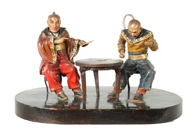 Lot 323 - A 19TH CENTURY ANGLO CHINESE WAX AND WOODEN MODEL OF TWO MEN PLAYING CARDS