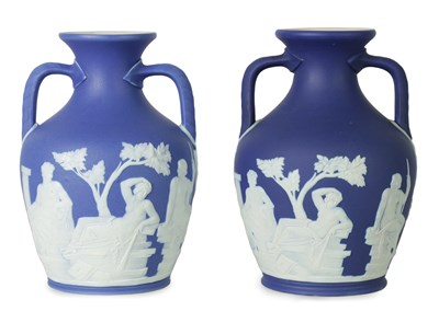 Lot 142 - A PAIR OF WEDGWOOD DARK BLUE JASPER WARE MODEL OF THE PORTLAND VASE CIRCA 1900