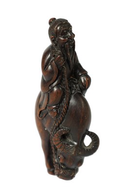 Lot 348 - A JAPANESE MEIJI PERIOD HARDWOOD NETSUKE