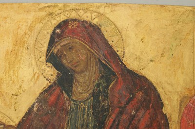 Lot 969 - A 19TH CENTURY GREEK SCHOOL LAMENTATION ICON OIL ON PANEL