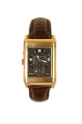 Lot 479 - A GENTLEMAN’S 18CT ROSE GOLD JAEGER-LECOULTRE REVERSO NIGHT & DAY WRISTWATCH