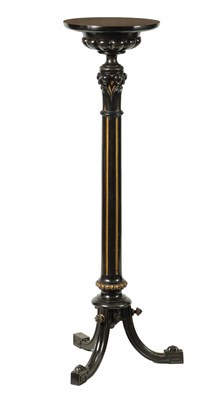 Lot 1381 - A LATE 19TH CENTURY EBONY AND GILT-HIGHLIGHTED TORCHERE