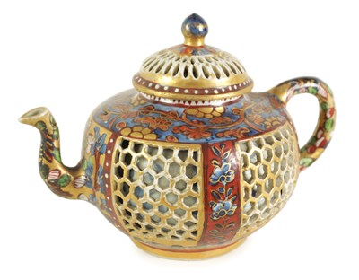 Lot 165 - AN 18TH CENTURY CHINESE DOUBLE WALLED RETICULATED TEAPOT