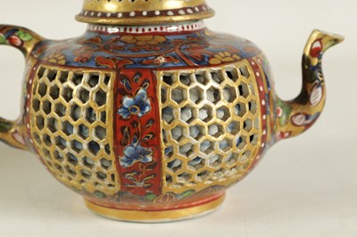 Lot 165 - AN 18TH CENTURY CHINESE DOUBLE WALLED RETICULATED TEAPOT