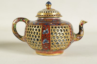 Lot 165 - AN 18TH CENTURY CHINESE DOUBLE WALLED RETICULATED TEAPOT