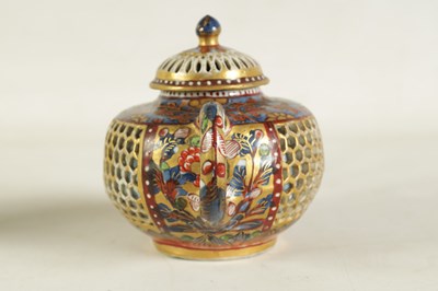 Lot 165 - AN 18TH CENTURY CHINESE DOUBLE WALLED RETICULATED TEAPOT