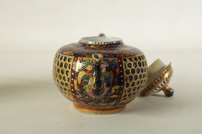 Lot 165 - AN 18TH CENTURY CHINESE DOUBLE WALLED RETICULATED TEAPOT