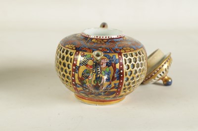 Lot 165 - AN 18TH CENTURY CHINESE DOUBLE WALLED RETICULATED TEAPOT