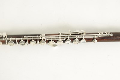 Lot 646 - A MID 19TH CENTURY WOODEN FLUTE BY RUDALL, CARTE & CO. NO. 385.