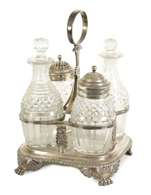 Lot 304 - A GEORGE III SILVER FOUR BOTTLE TABE CRUET