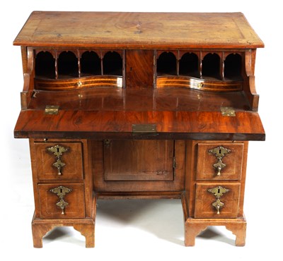 Lot 1054 - A QUEEN ANNE HERRING-BANDED FIGURED WALNUT SECRETAIRE KNEEHOLE DESK