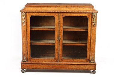 Lot 1018 - A 19TH CENTURY FIGURED WALNUT GLAZED DISPLAY CABINET