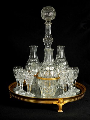 Lot 555 - A LATE 19TH CENTURY FRENCH ORMOLU AND CUT GLASS DECANTER SET