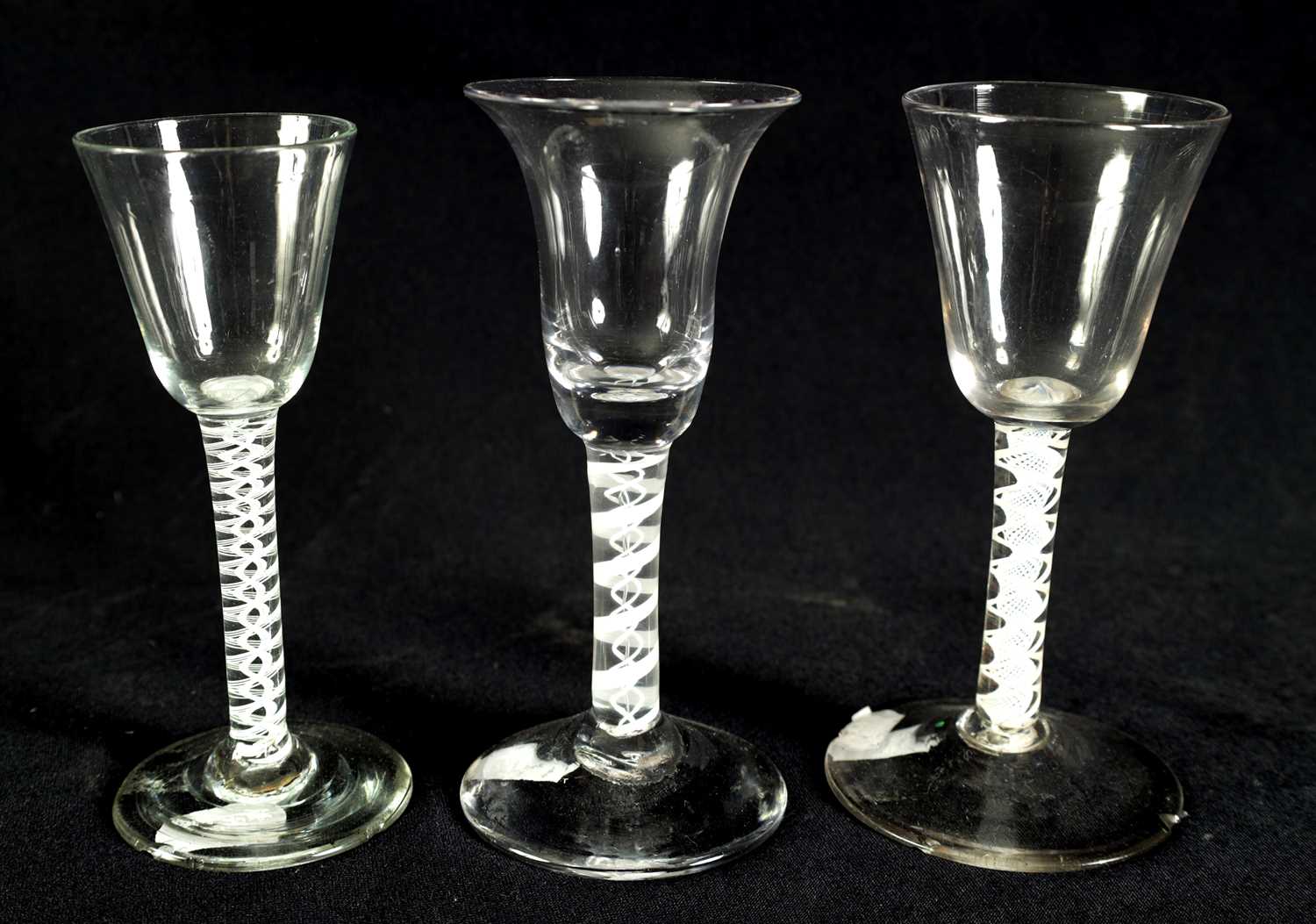 Lot 7 - COLLECTION OF THREE 18TH CENTURY AND LATER OPAQUE TWIST WINE GLASSES