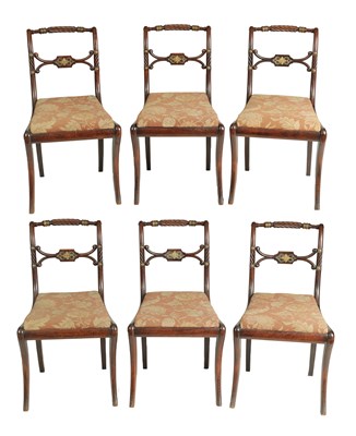 Lot 934 - A GOOD SET OF SIX REGENCY SIMULATED ROSEWOOD SABRE LEG DINING CHAIRS