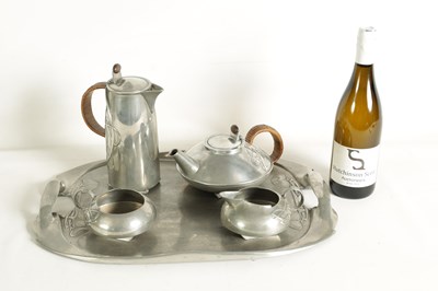 Lot 569 - AN EARLY 20TH CENTURY ARCHIBALD KNOX FOR LIBERTY AND CO. TUDRIC PEWTER TEA SET