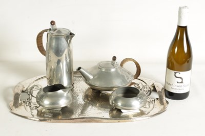 Lot 573 - AN EARLY 20TH CENTURY ARCHIBALD KNOX FOR LIBERTY AND CO. TUDRIC PEWTER TEA SET