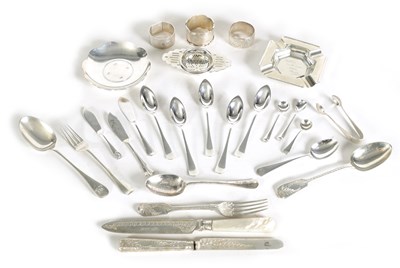 Lot 242 - A COLLECTION OF VARIOUS SILVER-WARE comprising of  TWO SHAPED ASHTRAYS, THREE SERVIETTE RINGS, TWO HANDLED TEA STRAINER, SET OF FIVE GRAPEFRUIT SPOONS AND OTHER VARIOUS CUTLERY