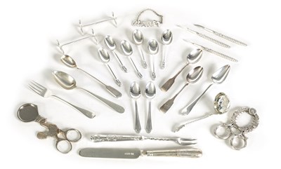 Lot 258 - A LARGE COLLECTION OF SILVER PLATED CUTLERY INCLUDING TWO BOILED EGG SCISSORS AND A PAIR OF KNIFE RESTS