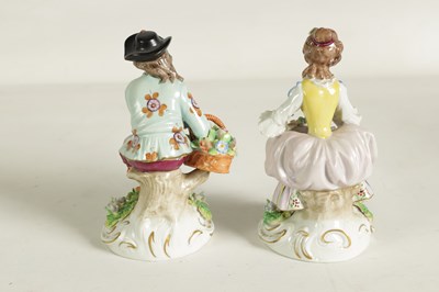 Lot 70 - A PAIR OF LATE 19TH CENTURY SITZENDORF FLOWER SELLER FIGURES