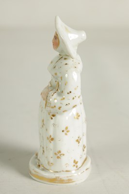 Lot 59 - A LATE 19TH CENTURY CONTINENTAL FIGURE OF A STANDING NUN