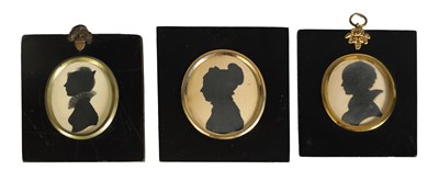 Lot 700 - THREE EARLY/MID 19TH CENTURY SILHOUETTE BUST PORTRAITS ON CARD OF YOUNG LADIES