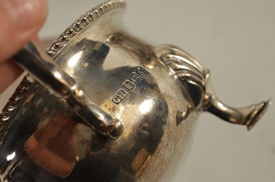 Lot 354 - A GEORGE V LARGE SILVER SAUCE BOAT