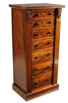 Lot 987 - A 19TH CENTURY FIGURED WALNUT WELLINGTON CHEST