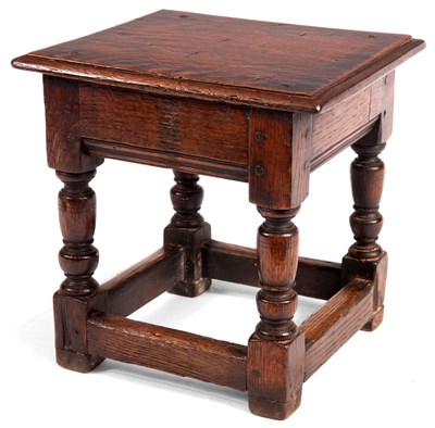 Lot 658 - A 17th Century style joined Oak STOOL the...